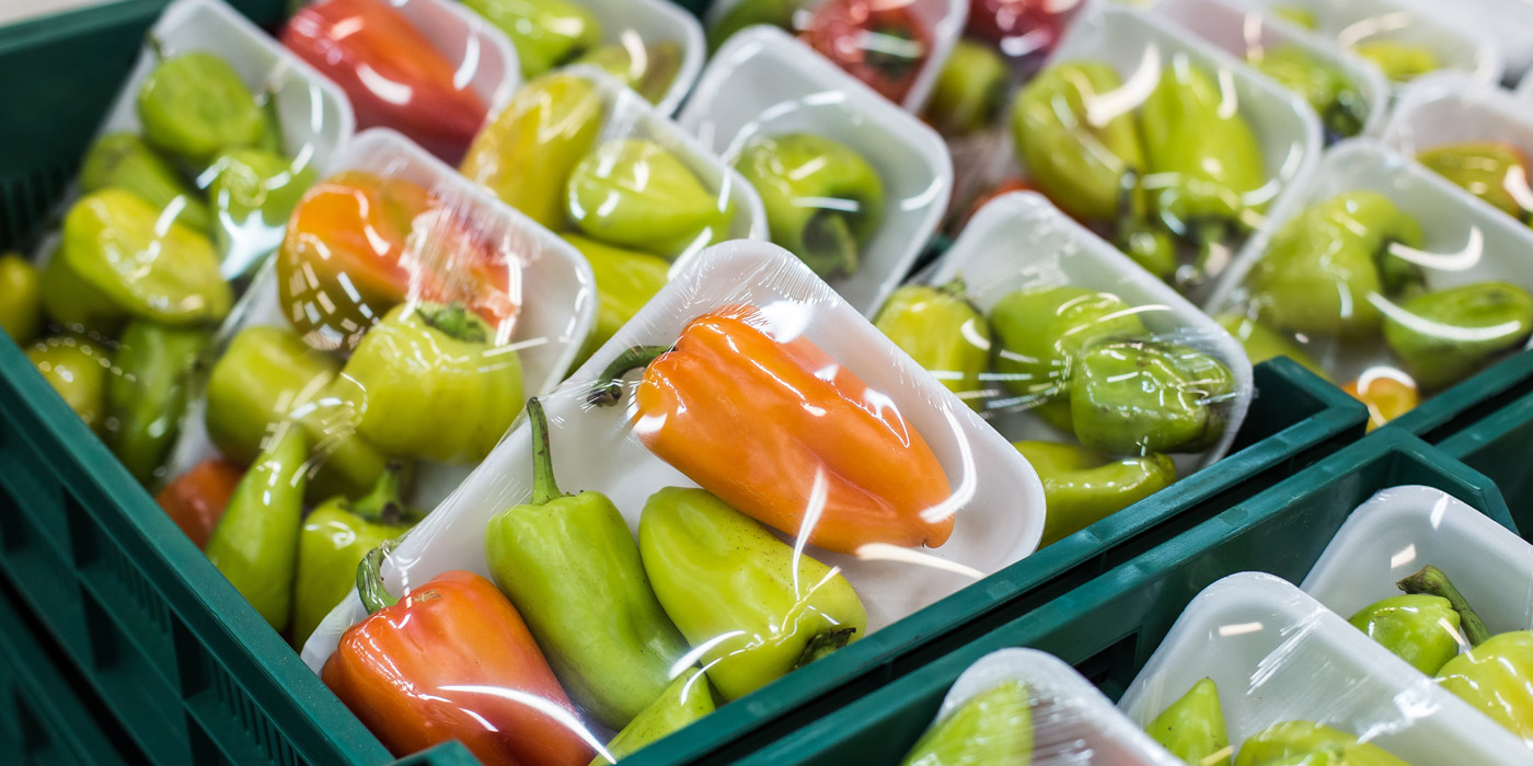 Fresh produce packaged in Styrofoam, and wrapped in plastic shrink-wrap